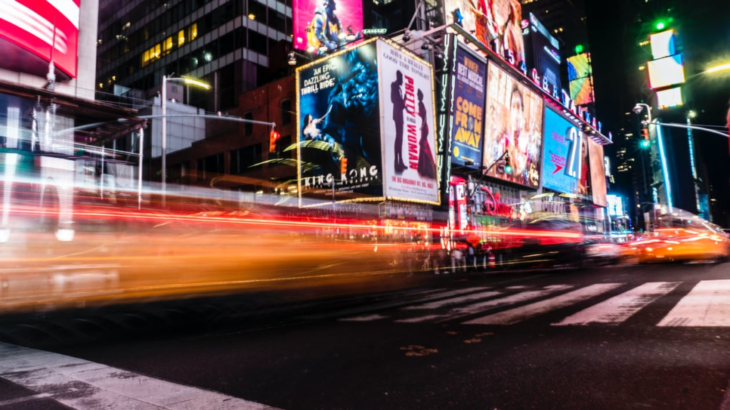 A Time-Lapse Image of LED Screens Dotting a Commercial Roadside