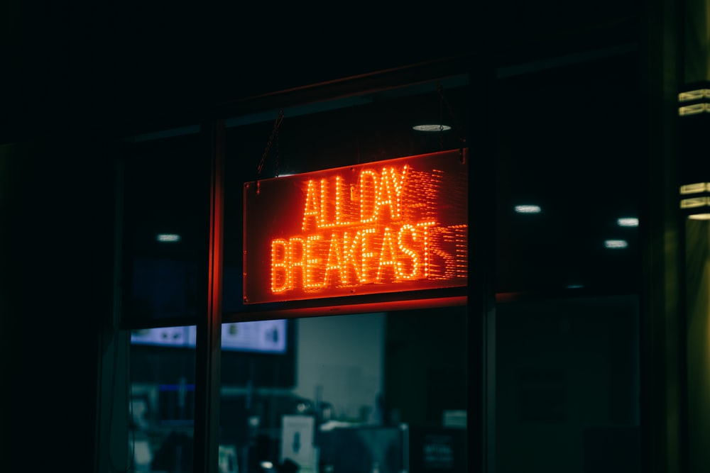A digital sign displaying ‘All Day Breakfast’. 