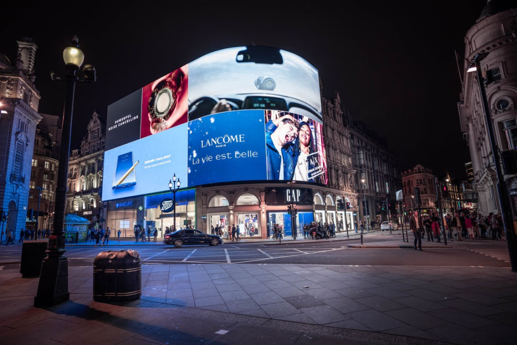 A digital billboard displaying advertisements. 